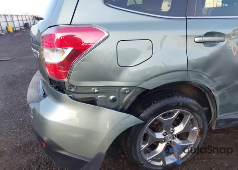 2016 Subaru Forester 2.5I Touring z USA, uszkodzony, nr VIN JF2SJAVC5GH507374